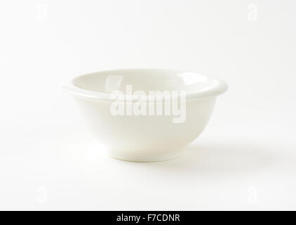 Small round white sauce bowl Stock Photo
