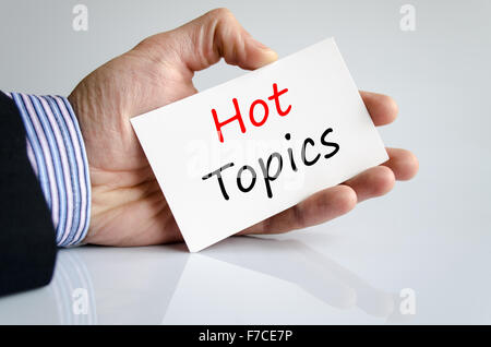 Hot topics text concept isolated over white background Stock Photo - Alamy
