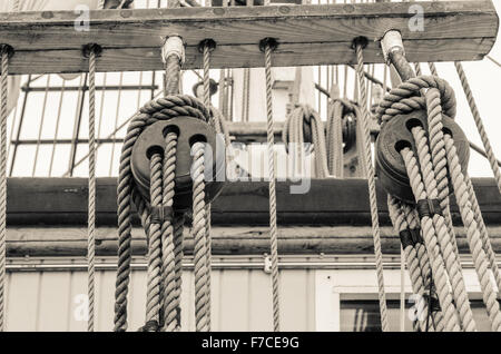 Blocks and rigging of an old sailboat, close-up Stock Photo