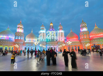 Evening view of illuminated Gate of the World at Global Village 2015 in Dubai United Arab Emirates Stock Photo