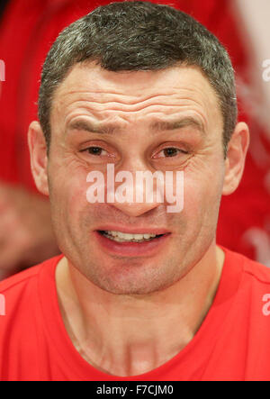 Vitali Kitscho, brother of Vladimir Klitschko, speaks during a press conference after the world heavyweight title fight between Vladimir Klitschko and British boxer Tyson Fury at the Esprit Arena in Duesseldorf, Germany, 28 November 2015. Tyson Fury of Britain is the new heavyweight world champion after defeating long-reigning Ukrainian Vladimir Klitschko in a unanimous decision in Dusseldorf. Fury, 27, won the titles of the three most important ranking organizations, the IBF, WBO and WBA, in front of 45,000 spectators by a scores of 115-112, 115-112 and 116-111. Photo: FRISO GENTSCH/dpa Stock Photo