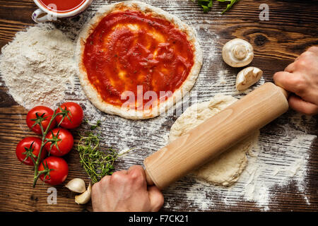 Fresh original Italian raw pizza preparation Stock Photo