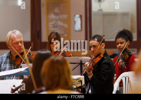 playing violin in a rehearsal Stock Photo