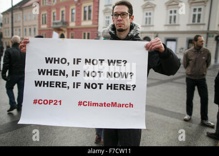 (151129) -- LJUBLJANA, Nov. 29, 2015 (Xinhua) -- People attend the People's Climate March in Ljubljana, Slovenia, Nov. 29, 2015. People gathered in Ljubljana's Congress Square to participate in the People's Climate March ahead of the United Nations Conference on Climate Change scheduled to be held in Paris on Monday. (Xinhua/Luka Dakskobler) (djj) Stock Photo