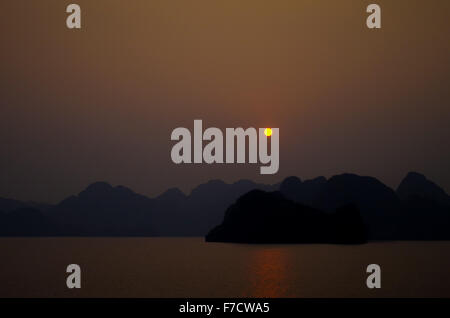 Sunset photographed from ship in Halong Bay