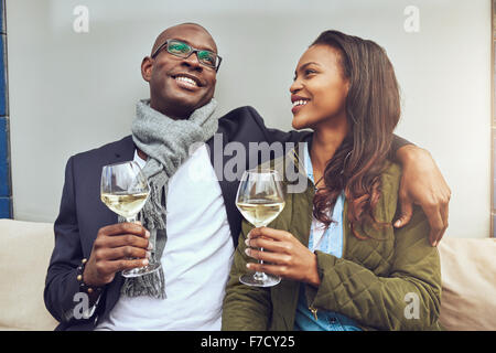 Black couple having a good time drinking a glass of wine Stock Photo