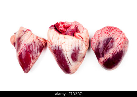 Hearts coated with a layer of fat caused by high cholestrol lipid lipids damage Stock Photo