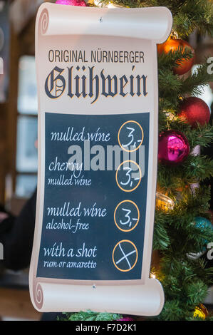 Sign offering Glühwein(mulled wine) at a Christmas Continental Market in Belfast. Stock Photo