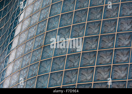 A glass brick, block background, wallpaper, pattern or texture. Stock Photo