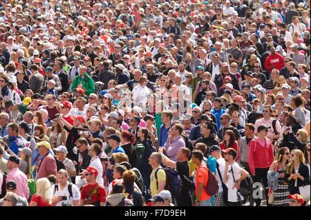 British fans invade the circuit to celebrate Lewis Hamilton's victory at the 2014 British F1 Grand Prix at Silverstone.