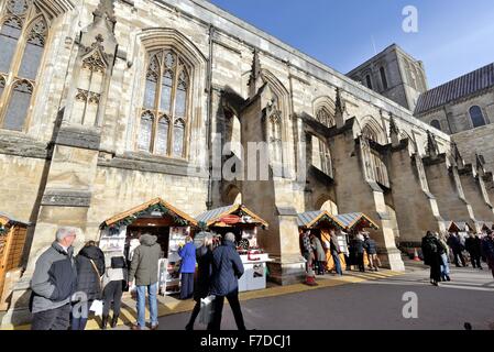 Christmas market in the grounds of Winchester cathedral Hampshire Stock Photo