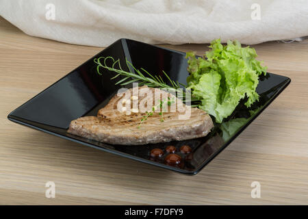 Grilled tuna steak with rosemary and cedar nut Stock Photo