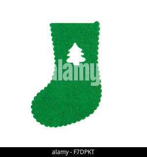 hand made green christmas sock with christmas tree cut out on white Stock Photo