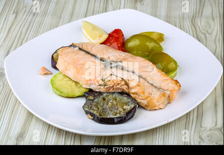 Baked salmon with wegetables - pepper, tomato and eggplant Stock Photo ...