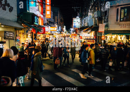 Taipei, Taiwan - January 30, 2015: The view of Shilin night market at night with many tourists. Stock Photo