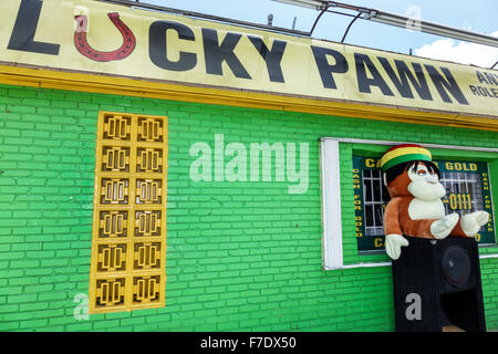 Miami Florida,pawn shop,front,sign,visitors travel traveling tour tourist tourism landmark landmarks culture cultural,vacation group people person sce Stock Photo