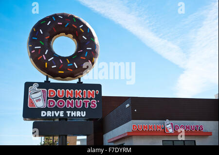 Dunkin' Donuts with a large donut on top of sign Stock Photo