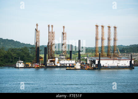 PANAMA CANAL, Panama--The construction site of the new locks being build adjacent to the existing Miraflores Locks on the Panama Canal in Panama City, Panama. Opened in 1914, the Panama Canal is a crucial shipping lane between the Atlantic and Pacific Oceans that mean that ships don't have to go around the bottom of South America or over the top of Canada. The Canal was originally built and owned by the United States but was handed back to Panama in 1999. Stock Photo