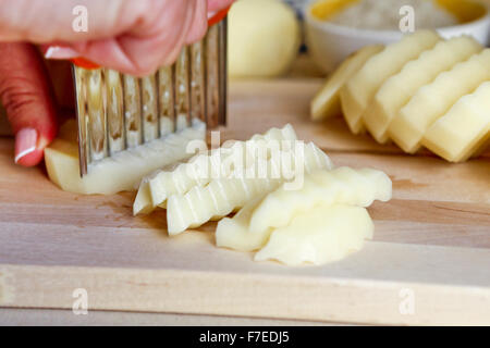 Home made potato chips (french fries). This image has a restriction for licensing in Israel Stock Photo