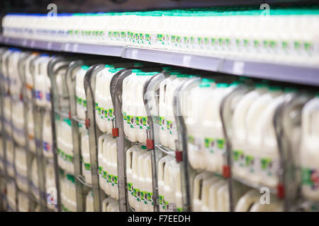 plastic bottles of milk in a  Morrisons supermarket Stock Photo