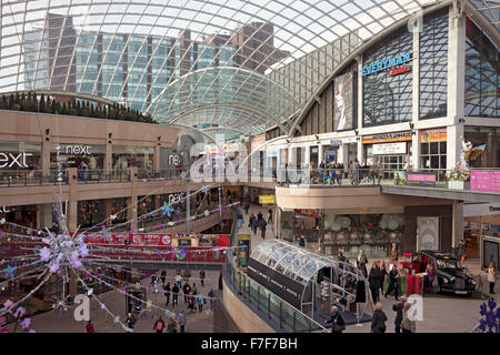 People shoppers at Trinity shopping centre indoor mall Leeds town city West Yorkshire England UK United Kingdom GB Great Britain Stock Photo