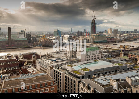 The view from St.Paul's Cathedral overlooking London across The River Thames and London landmarks on a stormy weather day. Stock Photo