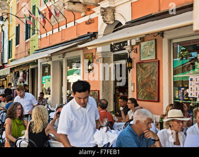 Patrons at an outdoor cafe restaurant, Burano, Venice, Italy Stock Photo