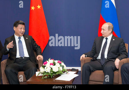 Paris, France. 30th Nov, 2015. Chinese President Xi Jinping (L) meets with Russian President Vladimir Putin in Paris, France, Nov. 30, 2015. Credit:  Huang Jingwen/Xinhua/Alamy Live News Stock Photo
