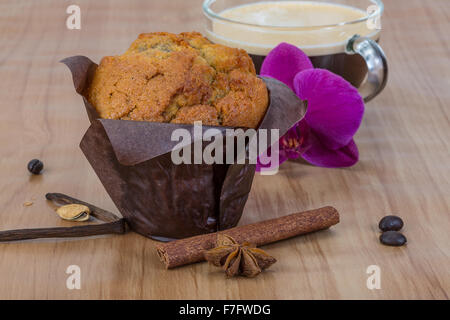 Muffin with coffee served bright orchid Stock Photo - Alamy