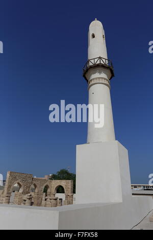 Minaret of Al Khamis Mosque, the oldest mosque in the Kingdom of  Bahrain Stock Photo