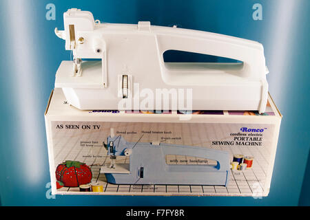 Ronco cordless electric portable sewing machine, circa 1970s Stock Photo