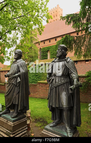Statues of Grand Masters of the Teutonic Knights in the medieval Castle in Malbork (Marienburg), Poland. Stock Photo