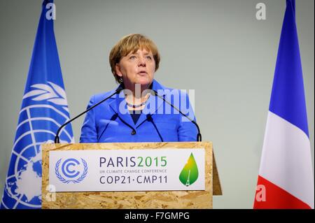 Le Bourget, France. 30th November, 2015. German Chancellor Angela Merkel addresses the plenary session of the COP21, United Nations Climate Change Conference November 30, 2015 outside Paris in Le Bourget, France. Stock Photo