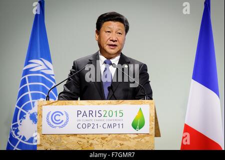 Le Bourget, France. 30th November, 2015. Chinese President Xi Jinping addresses the plenary session of the COP21, United Nations Climate Change Conference November 30, 2015 outside Paris in Le Bourget, France. Stock Photo