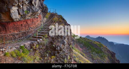 Mountain hiking trail from  Pico do Arieiro to Pico Ruivo before sunrise, Madeira Island, Portugal