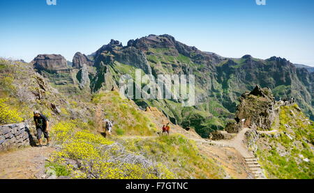 Tourists on the trail from  Pico do Arieiro to Pico Ruivo, Madeira Island, Portugal Stock Photo