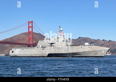 The Independence-class littoral combat ship USS Coronado (LCS-4) passes under the Golden Gate Bridge as it enters San Francisco Stock Photo