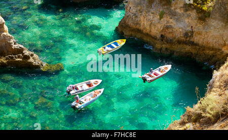 Boats on the clear shallow water, Algarve Coast Ponta da Piedade near Lagos, Portugal Stock Photo