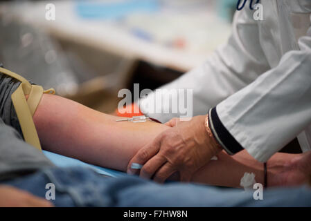 Person giving blood, close-up Stock Photo