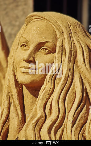 Sand Sculpture Festival  'Treasure Island' in Saint - Petersburg, August 3, 2014.Fragment the sculpture - female figure. Stock Photo