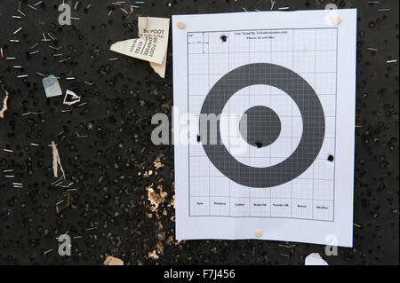 Bullet holes in shooting target Stock Photo