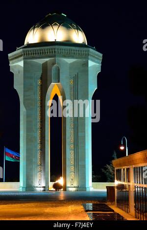 Monument in Baku, capital of Azerbaijan, to those killed on 20th January 1990, with a man silhouetted and looking at a grave Stock Photo