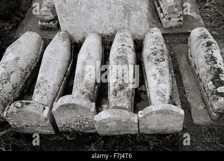 Charles Dickens' child graves in St James graveyard in Cooling in Kent in England in Britain in the United Kingdom. From the novel Great Expectations Stock Photo
