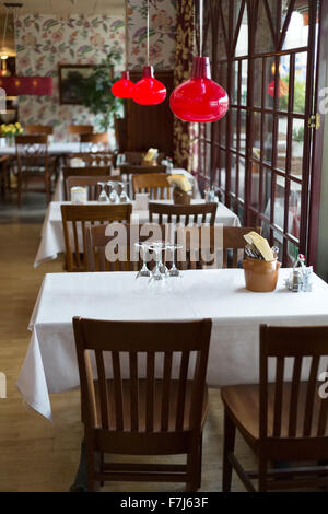 Interior of a small cozy restaurant in the north of Europe. Stock Photo