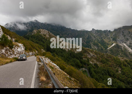 Marble quarries of the Apuan Alps, from the Via dei Colli road, Tuscany, Italy. A small workings creates a distinctive landmark. Stock Photo