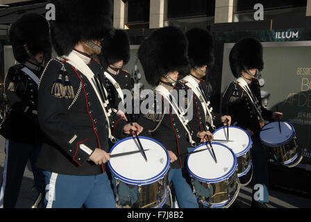 Copenhagen, Denmark. 1st December, 2015. Queen's guards marhcing through city to reach Amalienborgs palace for guards change at noon Credit:  Francis Dean/Alamy Live News Stock Photo