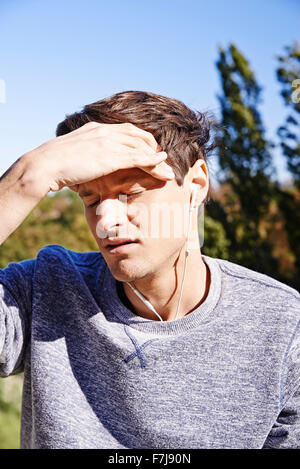 MAN WITH HEADACHE Stock Photo