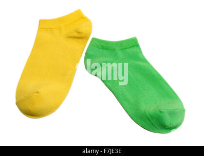 Two colored socks, yellow and green. Isolate on white. Stock Photo