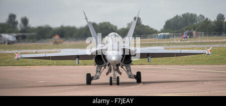 McDonnell Douglas F-18C Hornet of the Finnish Air Force taxis back to its parking position after displaying at the 2015 RIAT Stock Photo