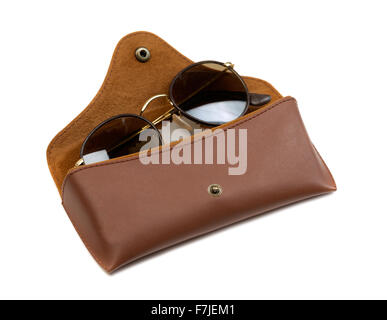 Sunglasses in brown leather case. Isolate on white. Stock Photo